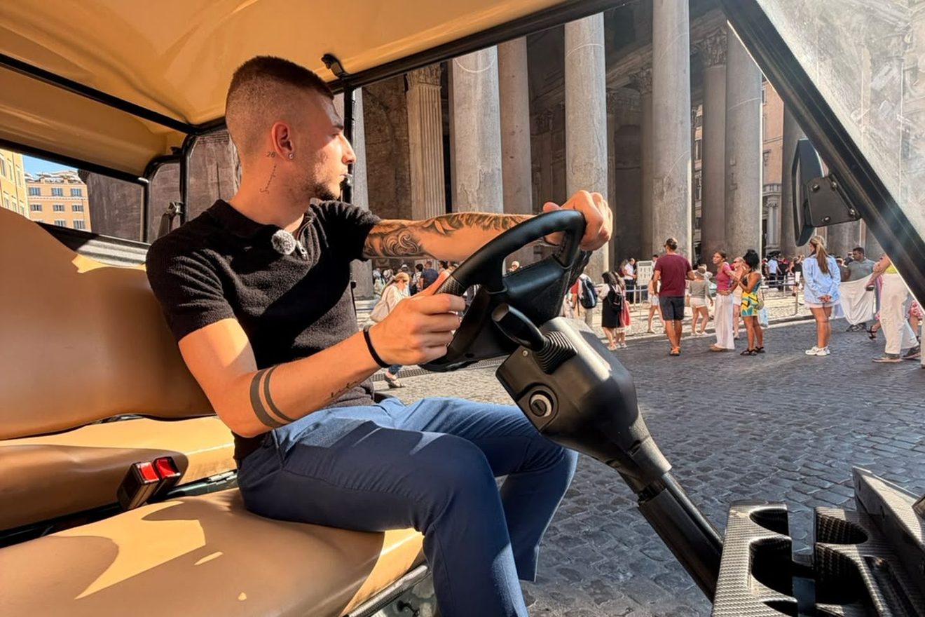 Inside the golf cart with the Pantheon columns alongside