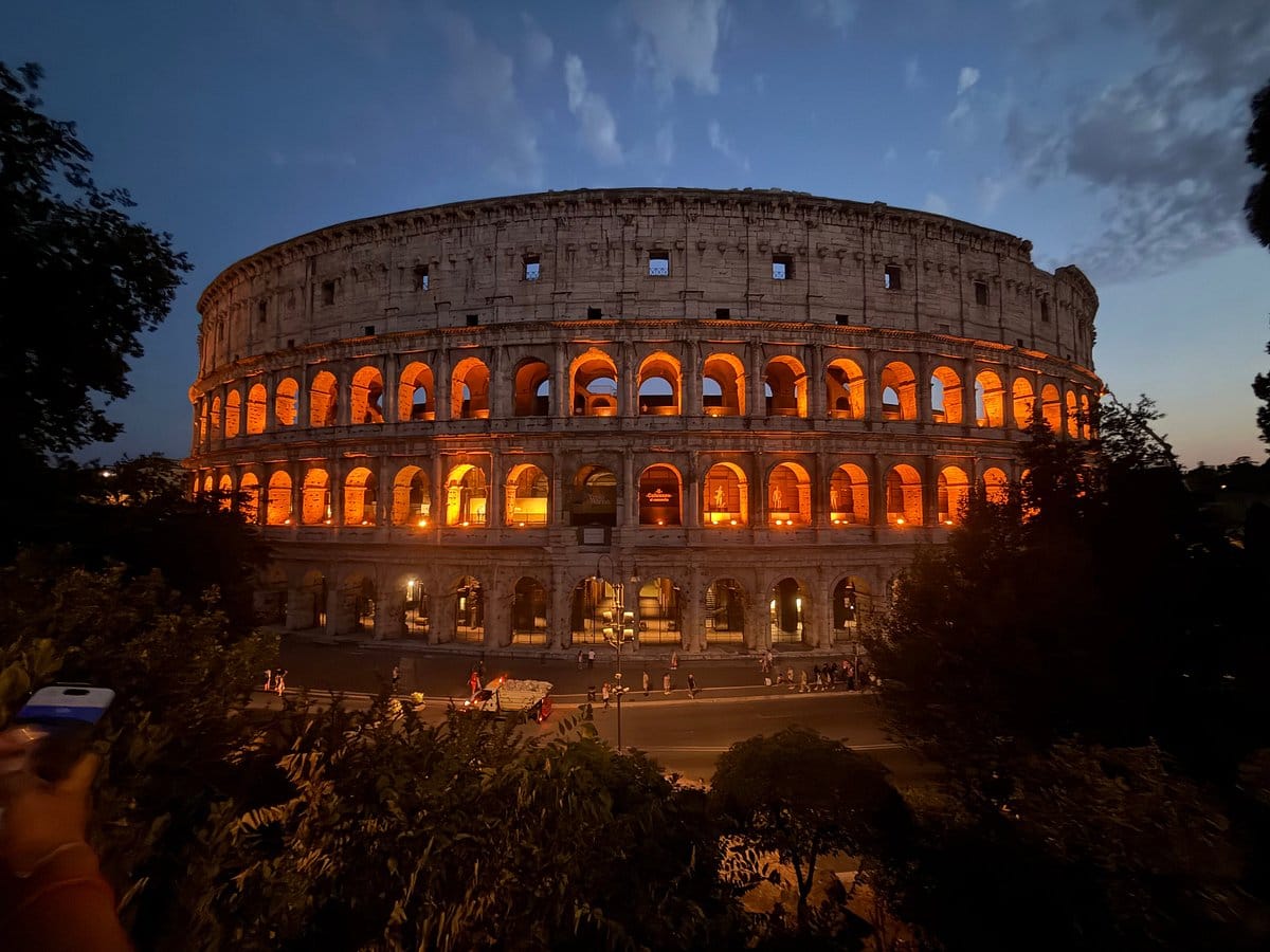 The Colosseum lit up at dusk